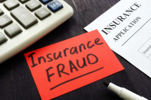 I've been charged with insurance fraud. What should I do?